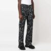 Pantalones rectos informales Off-White para hombre FW22 con efecto salpicadura de pintura, versión en negro
