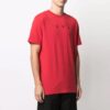 Polo de manga corta con estampado de flechas de la colección SS21, color rojo