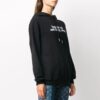 Sudadera con capucha y eslogan en letras blancas, color negro