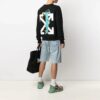Versión de manga larga con cuello redondo y estampado de Arrows SS21, negro