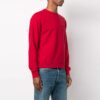 Versión de manga larga con cuello redondo y logotipo SS21 en rojo